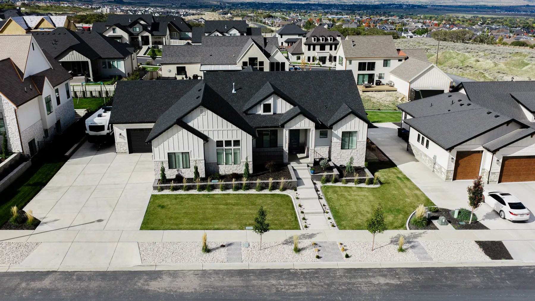 New-build front yard and walkway by J&H Landscaping in Utah County