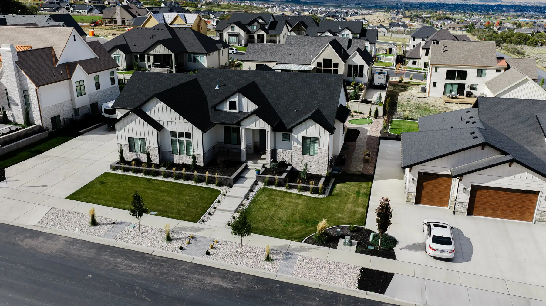 Front lawns and walkway by J&H Landscaping in Utah County