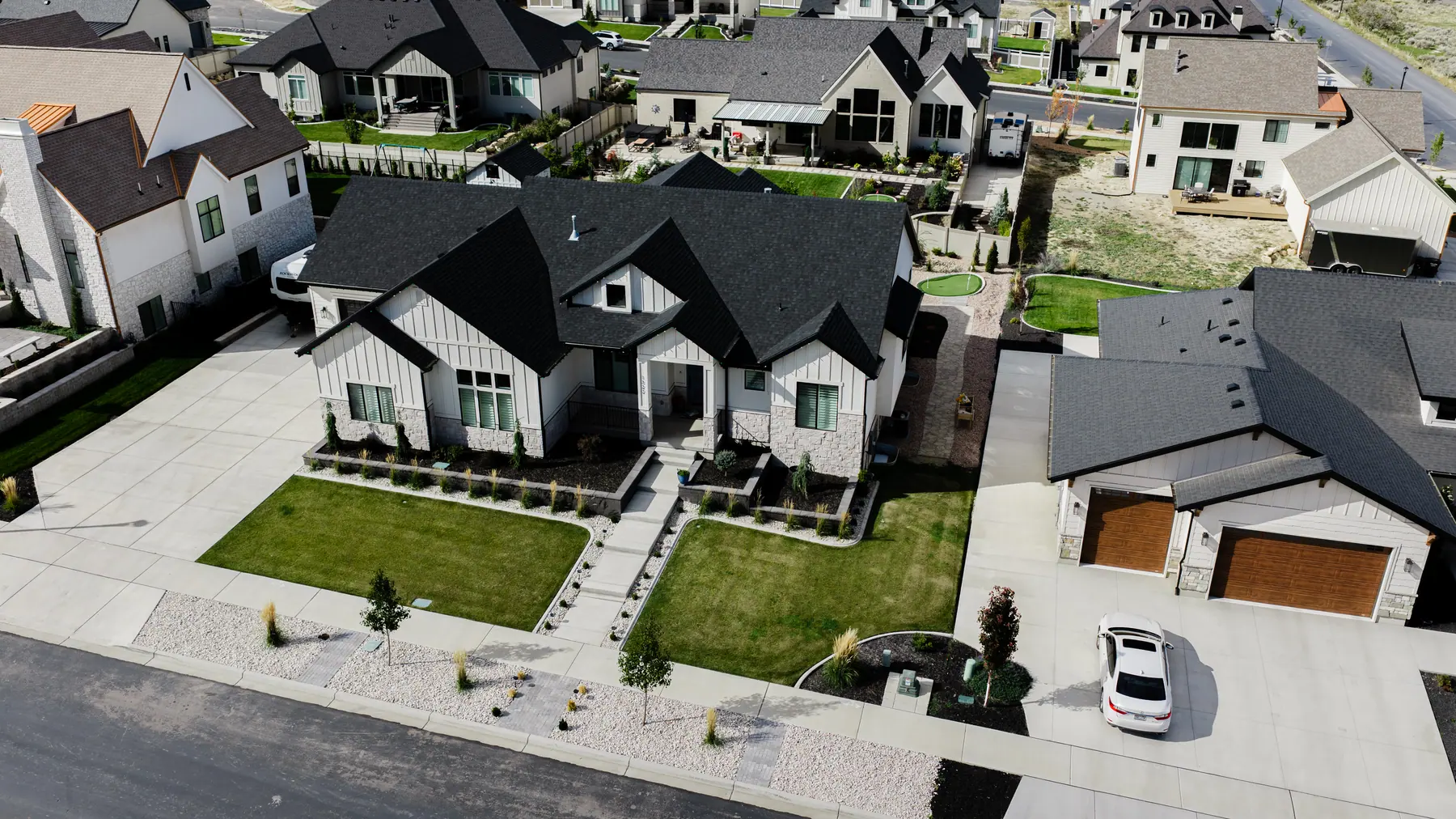 Front lawns from the street by J&H Landscaping in Utah County