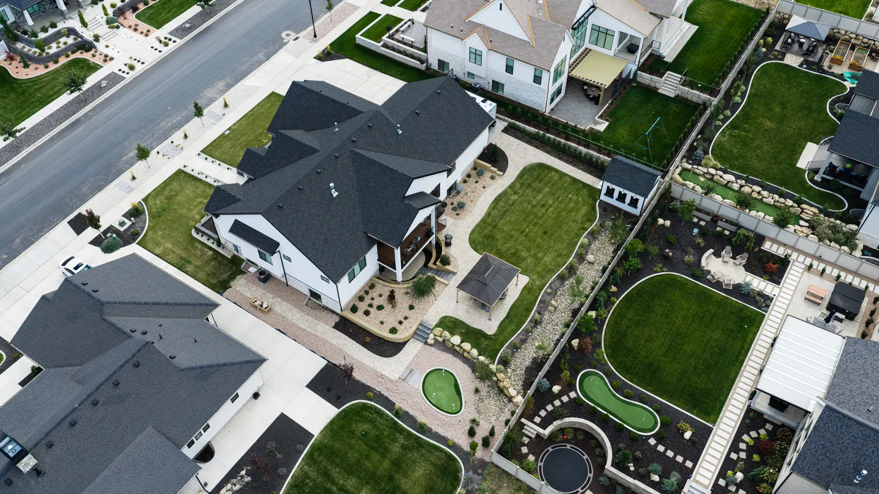 Backyard pavilion from above by J&H Landscaping in Utah County