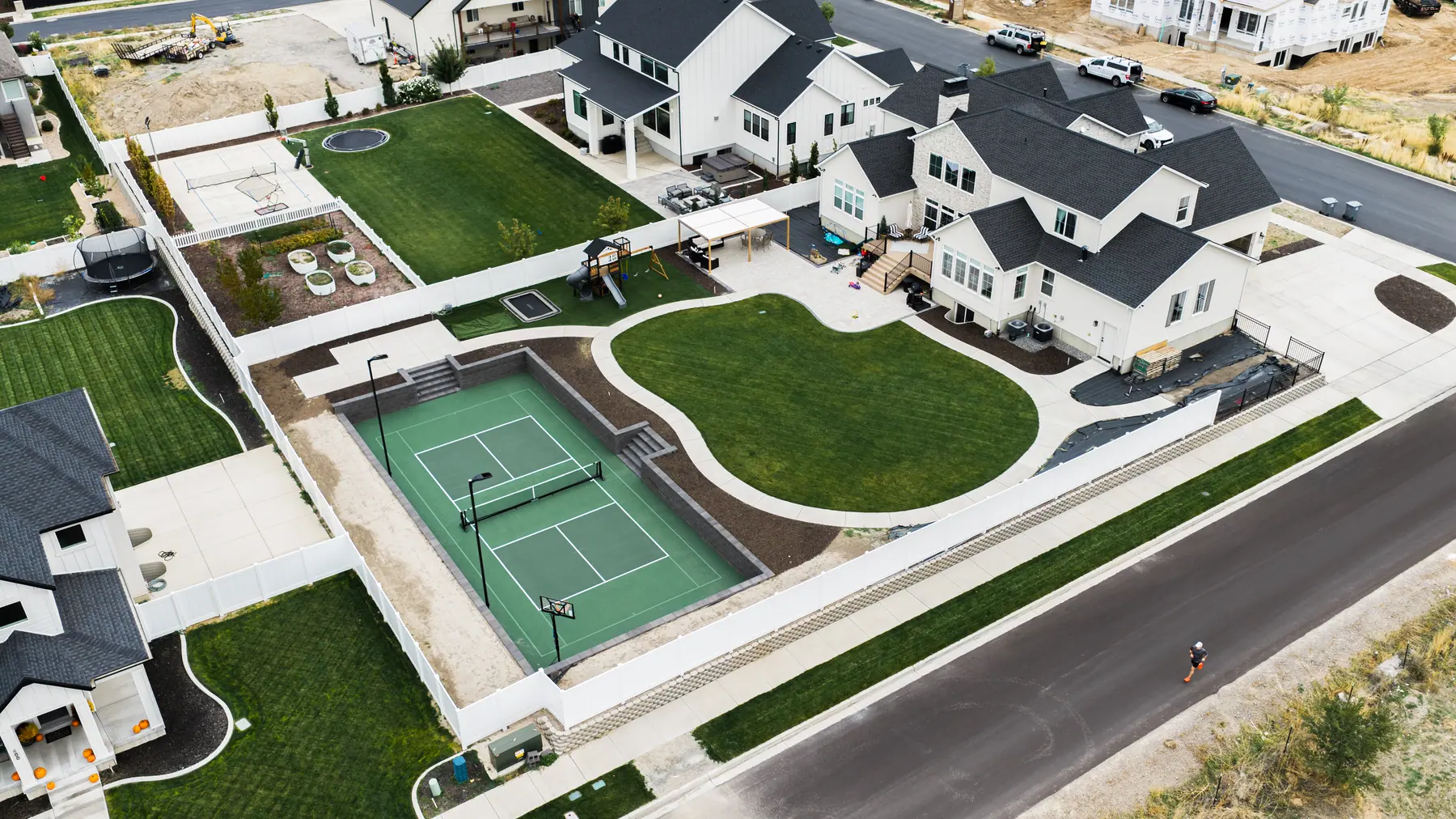 Pickleball court and lawn by J&H Landscaping in Mapleton