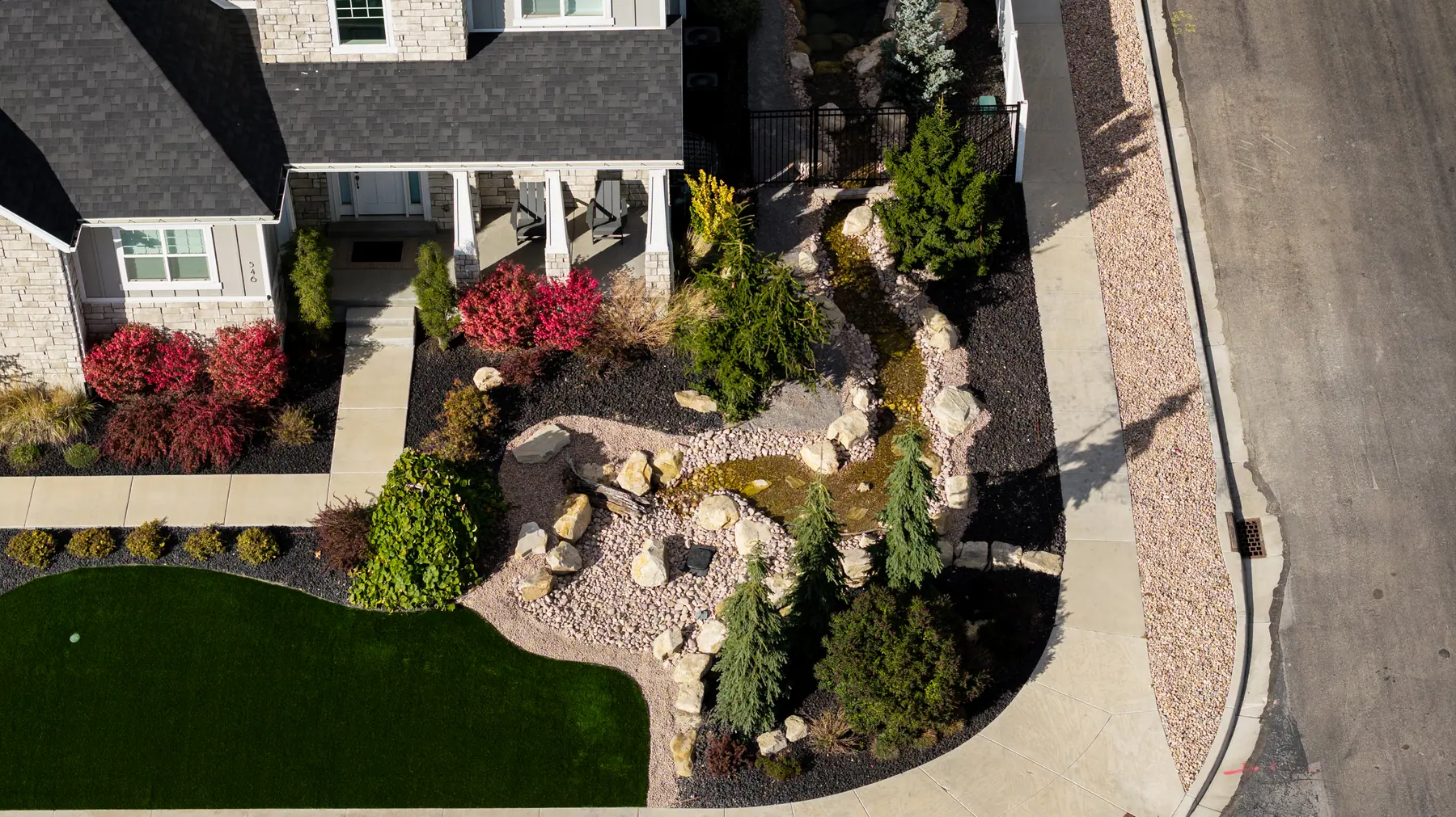 Boulder garden and planting by J&H Landscaping in American Fork