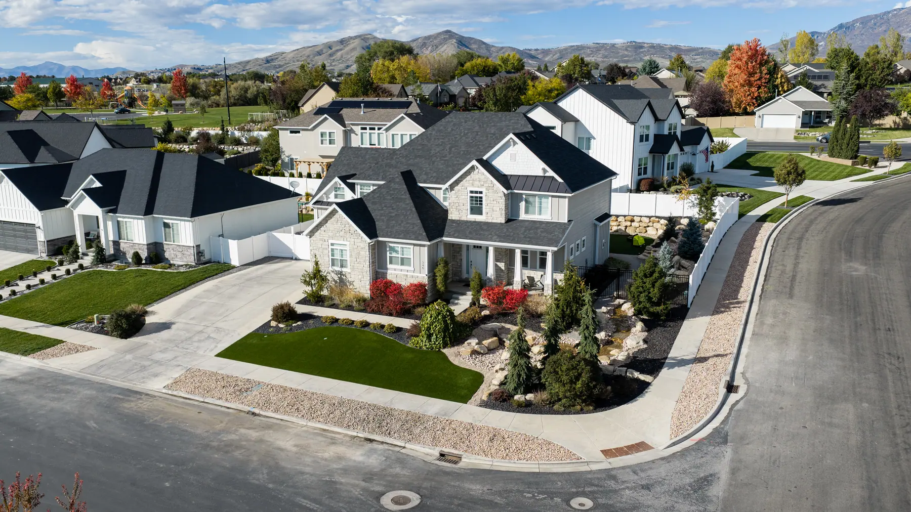 Front yard with mountain views by J&H Landscaping in American Fork