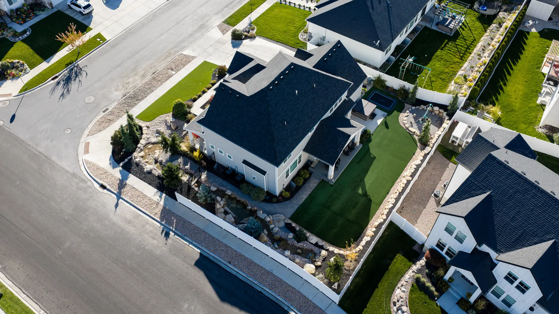 Side yard and turf from above by J&H Landscaping in American Fork