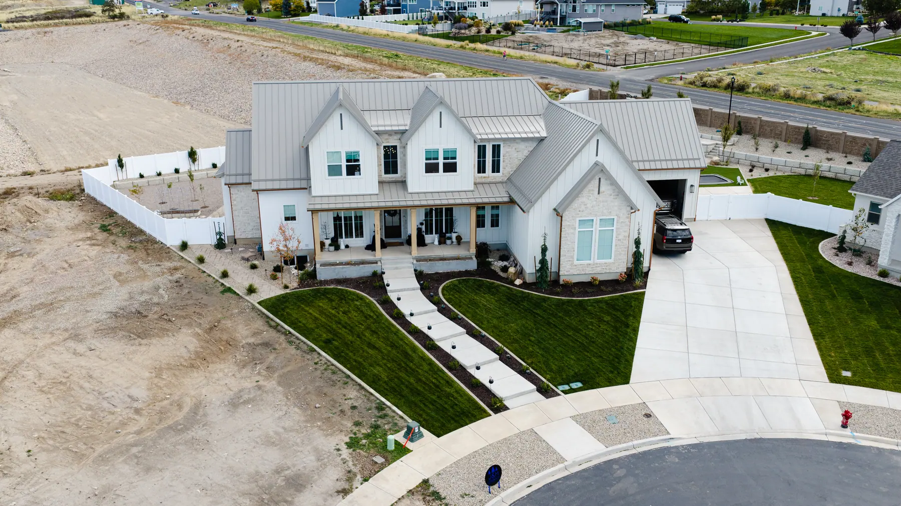 New-build front yard and walkway by J&H Landscaping in Utah County