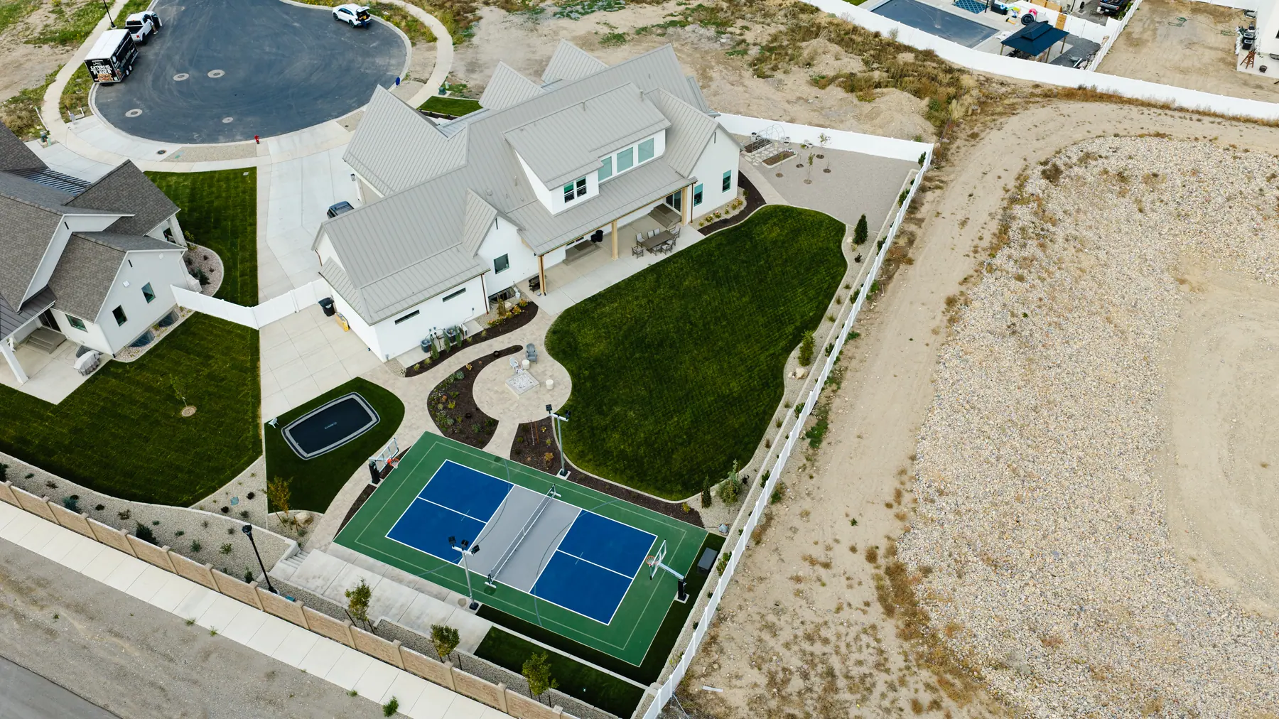 Court and lawn from above by J&H Landscaping in Utah County