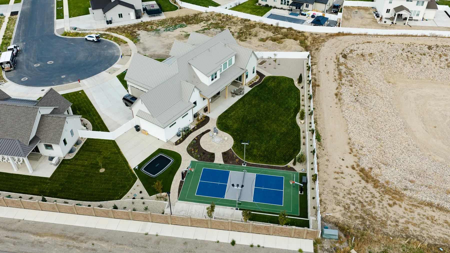 Backyard court on a new build by J&H Landscaping in Utah County