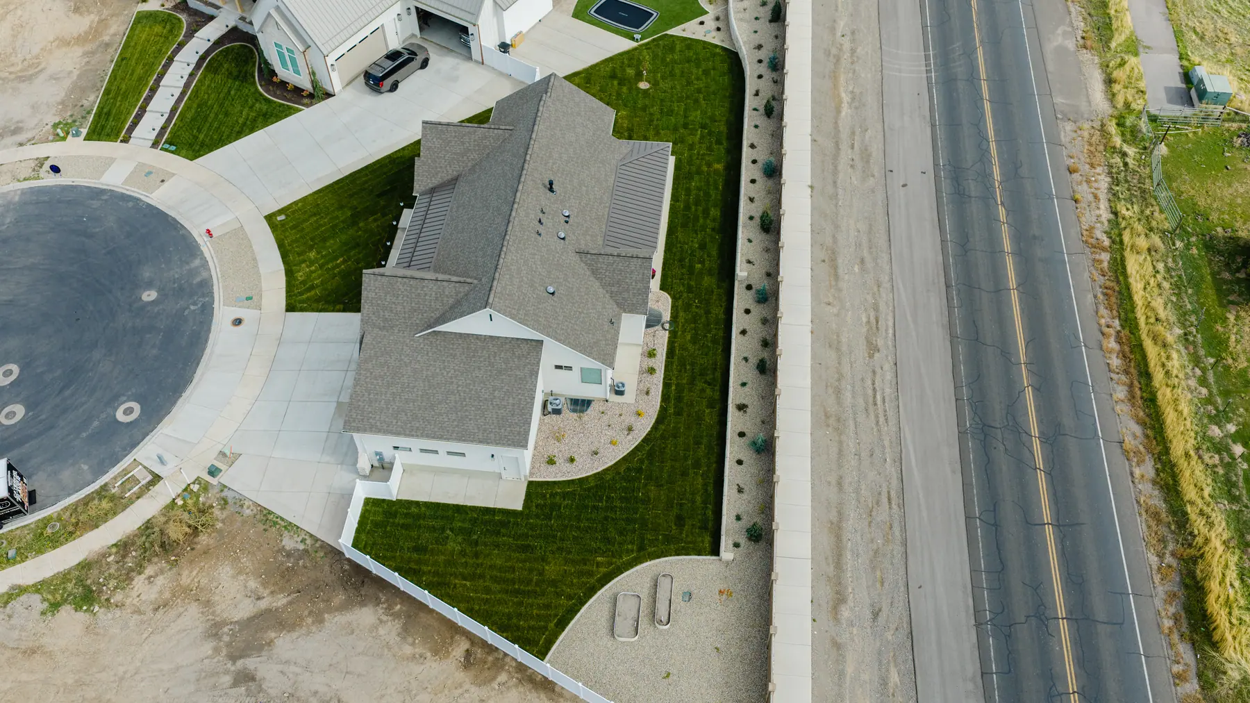 Side yard lawn from above by J&H Landscaping in Utah County
