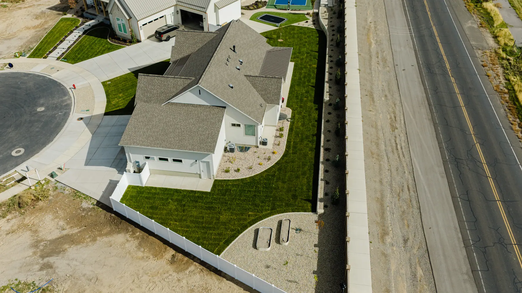 Side and front lawns by J&H Landscaping in Utah County