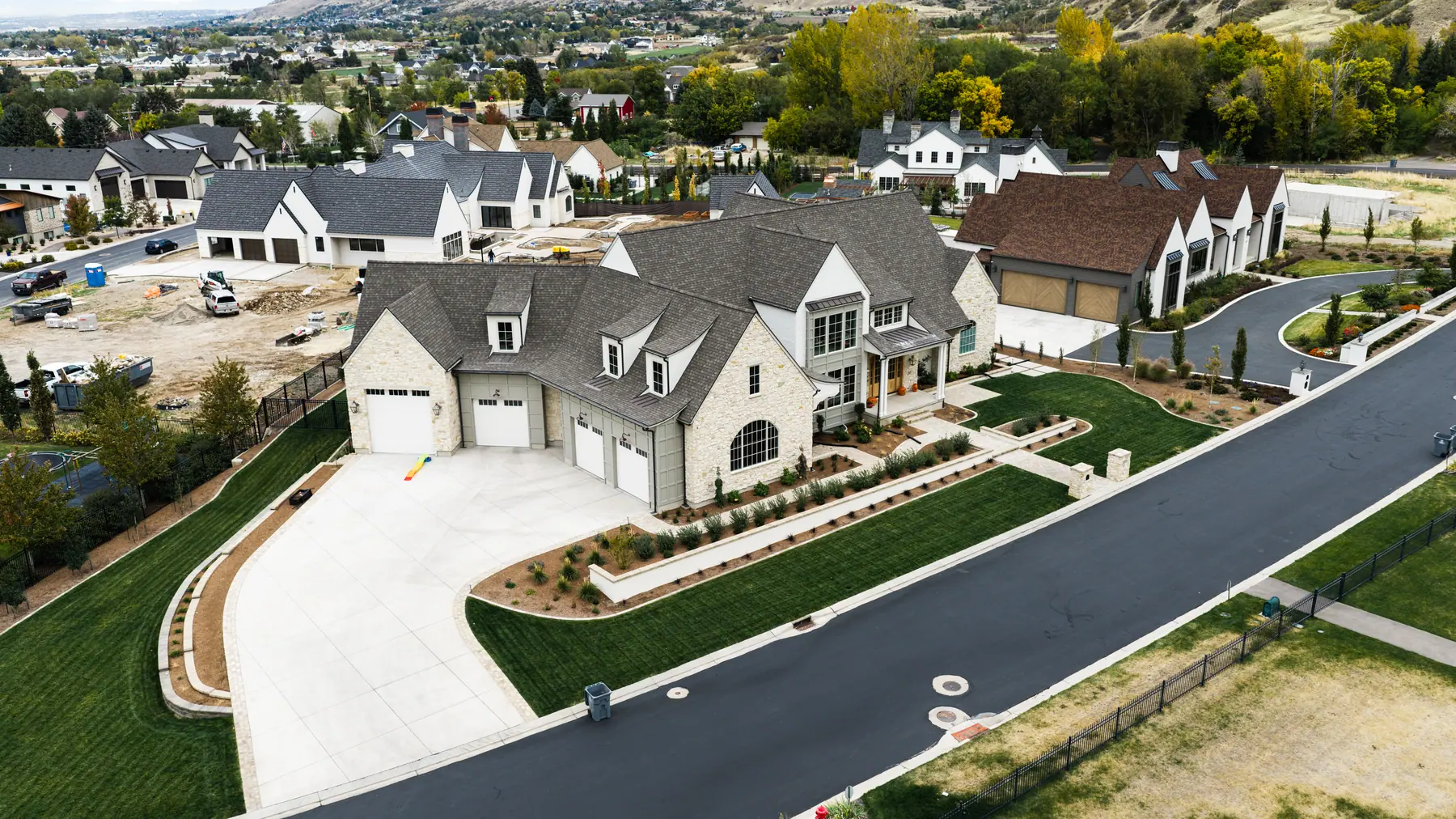 Front yard under the mountains by J&H Landscaping in Mapleton