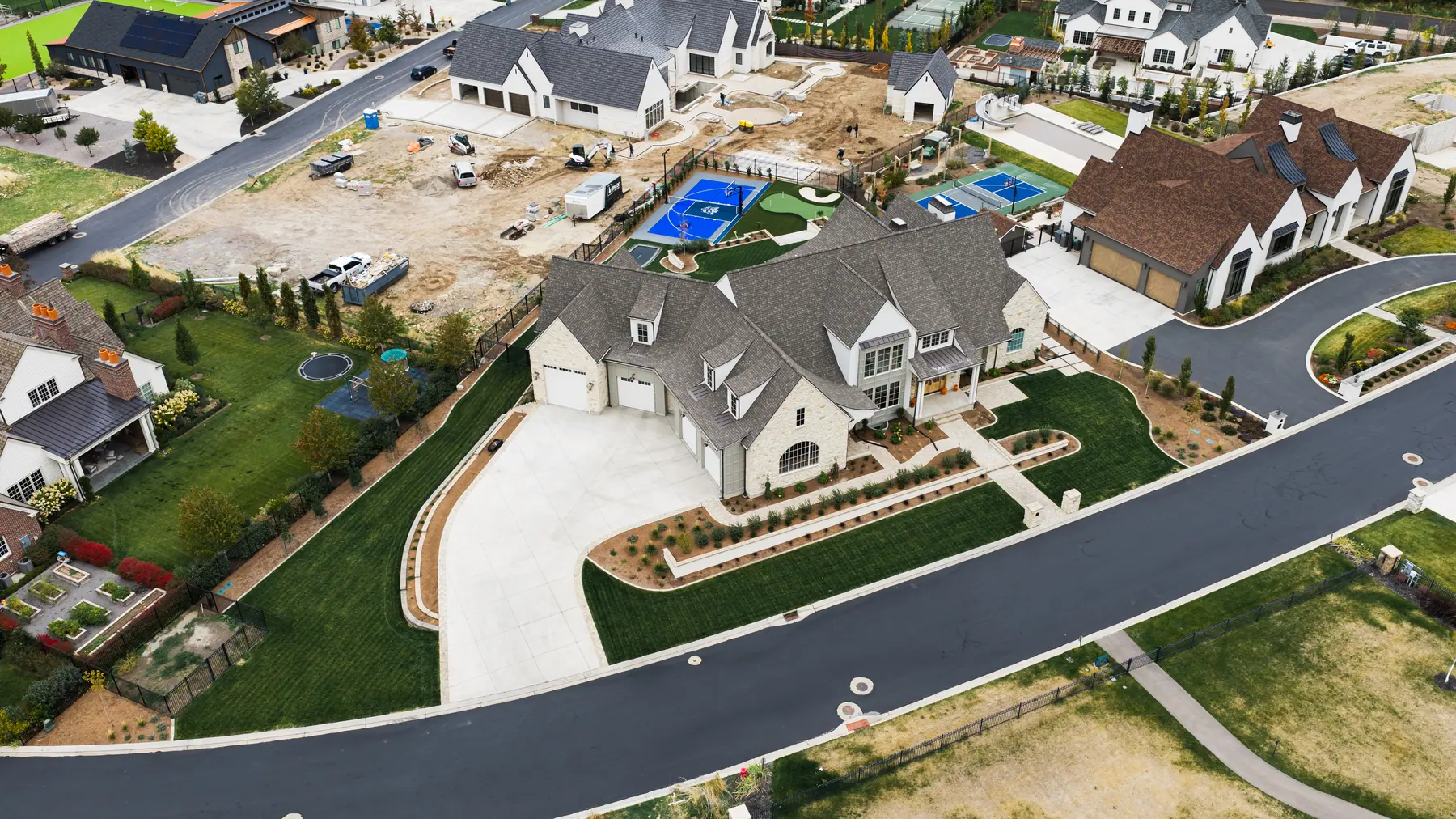 Front yard and side courts by J&H Landscaping in Mapleton