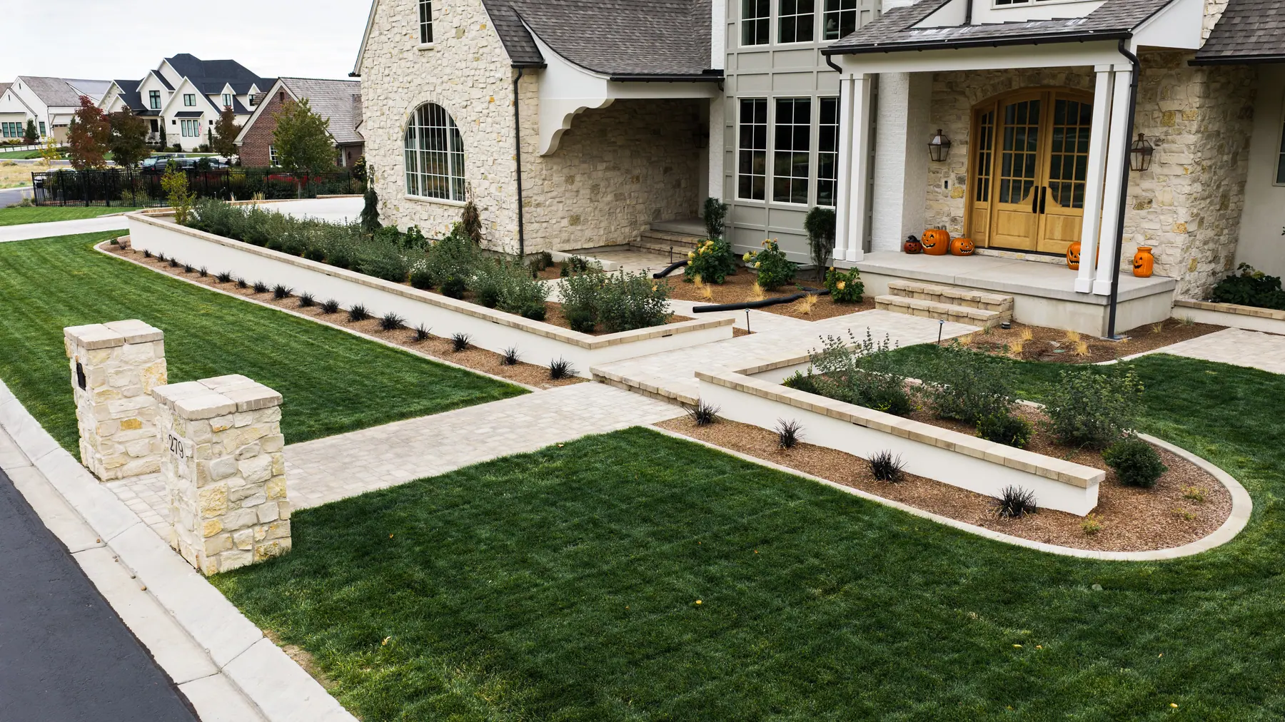 Front walkway and lawn by J&H Landscaping in Mapleton