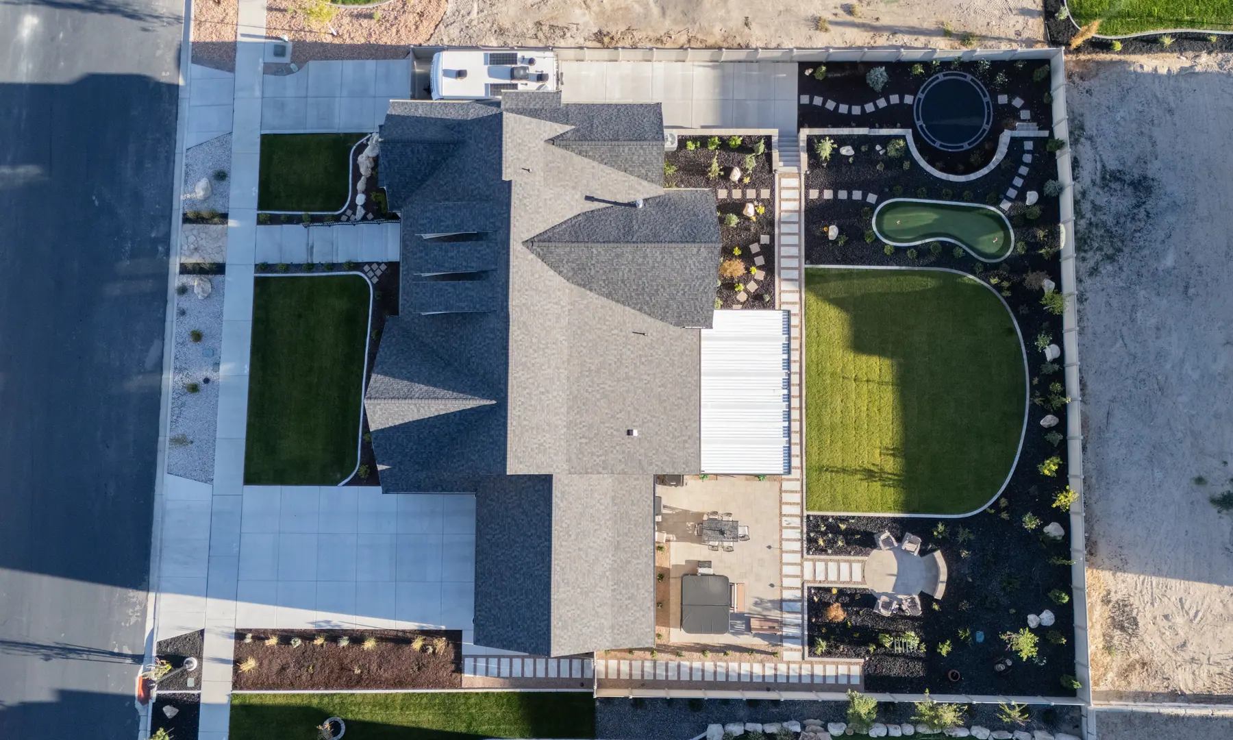 Backyard from above by J&H Landscaping in Salem