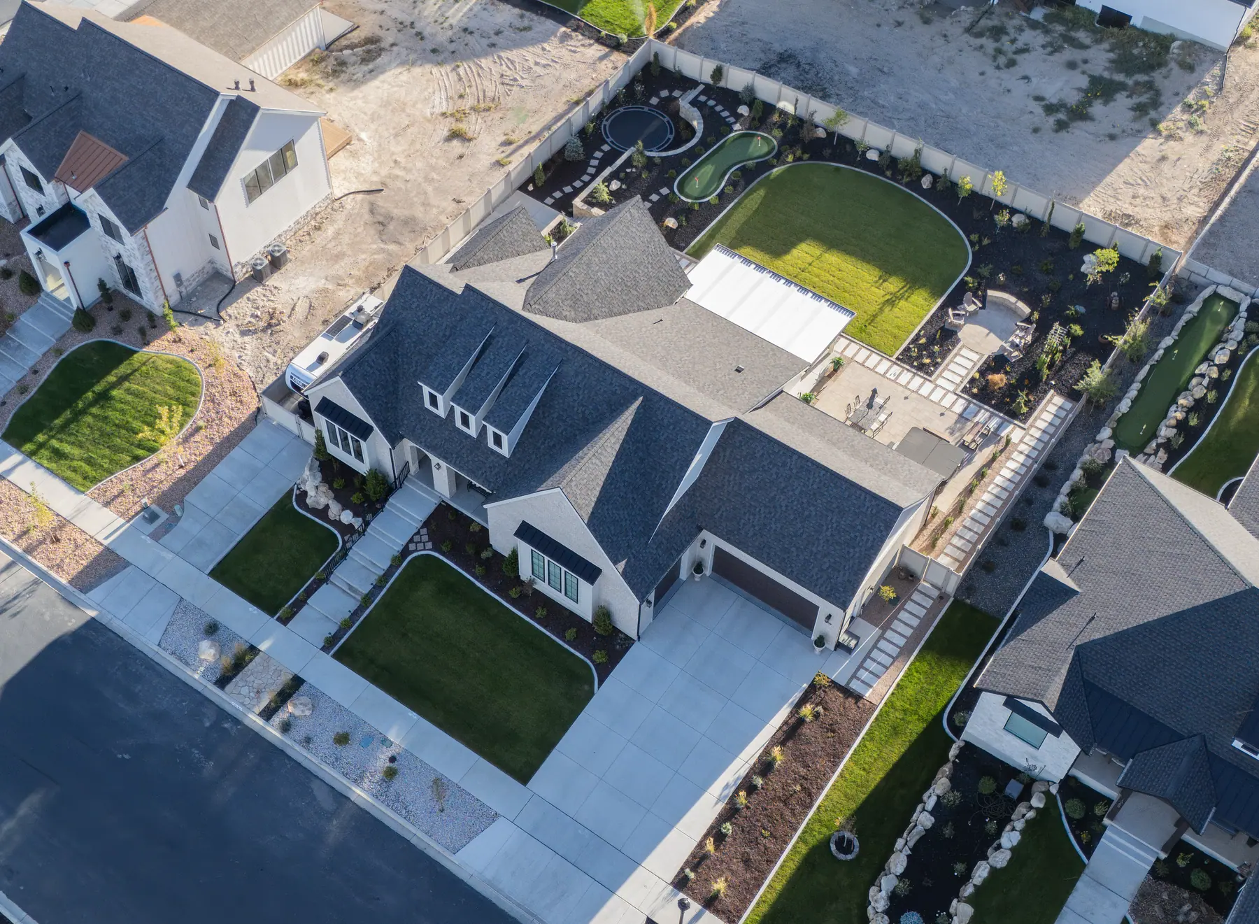 Front and back yards from above by J&H Landscaping in Salem