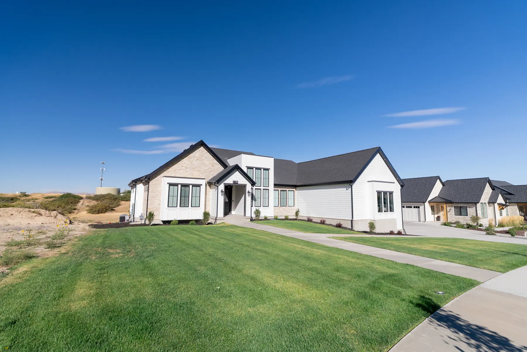 Wide front lawn by J&H Landscaping in Spanish Fork