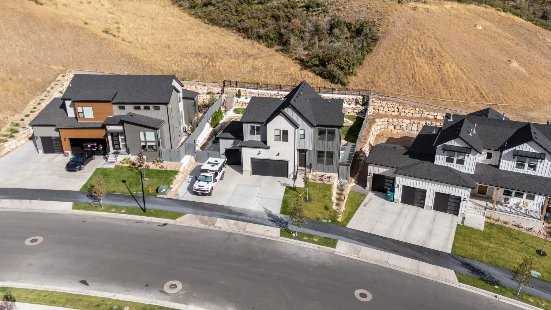 Hillside front yards from above by J&H Landscaping in Lehi