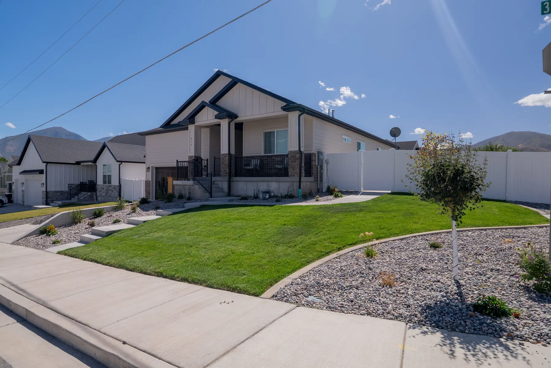 Front lawn and rock beds by J&H Landscaping in Payson