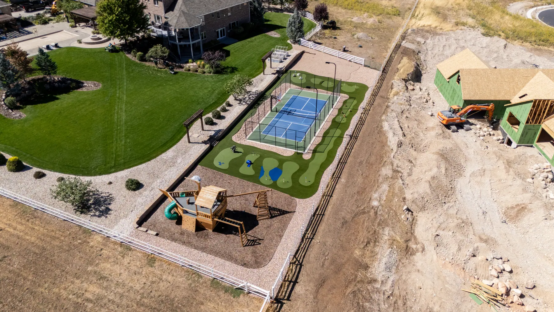 Court and turf course from above by J&H Landscaping in Elk Ridge