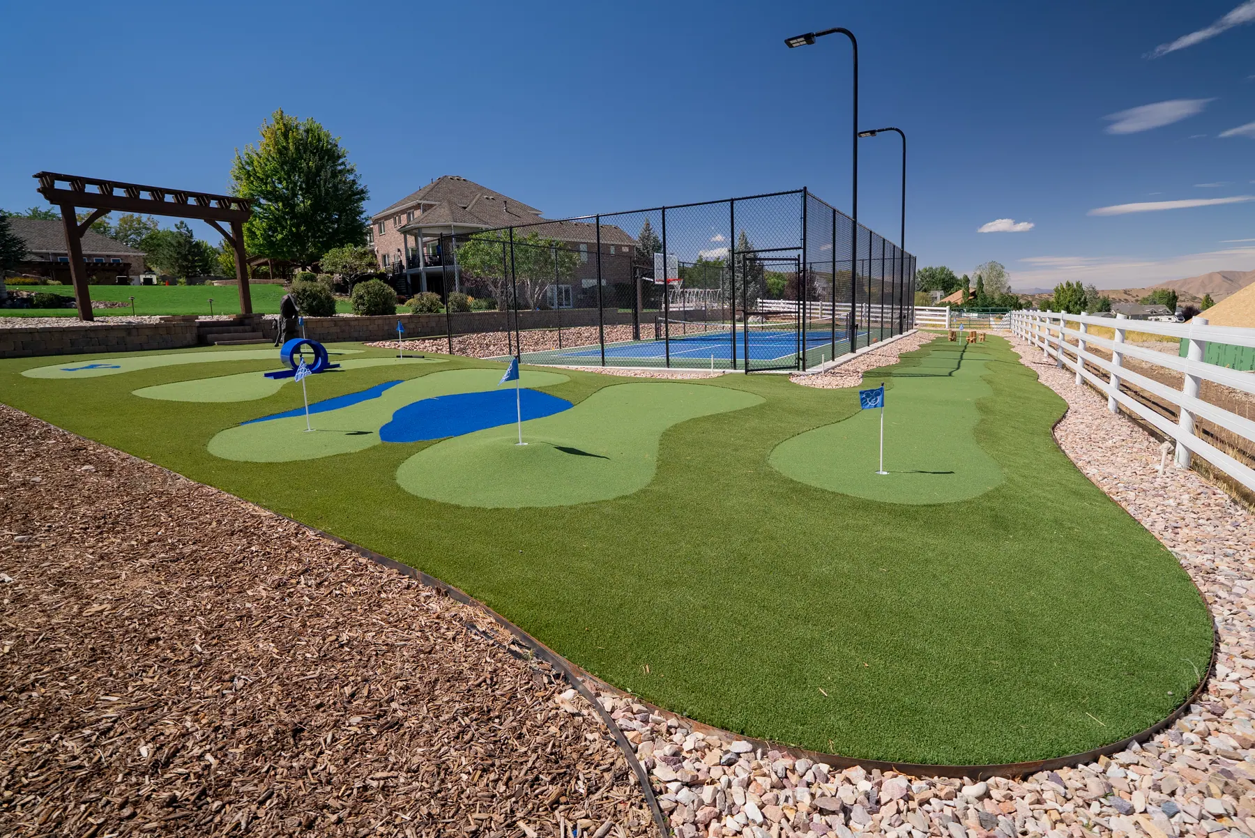 Putting green and court by J&H Landscaping in Elk Ridge