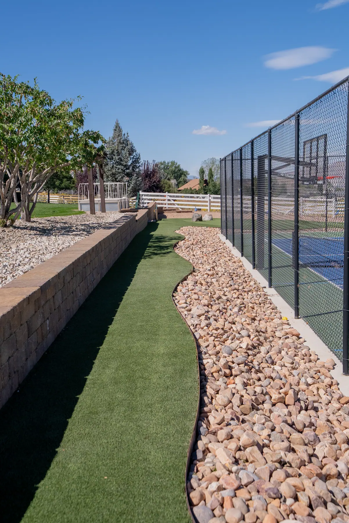 Block wall and turf run by J&H Landscaping in Elk Ridge