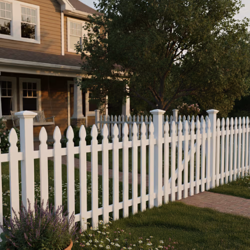 White picket fence surrounding a landscaped yard in Mapleton, Utah, showcasing a sturdy structure designed for durability and aesthetic appeal, complementing the home's exterior.